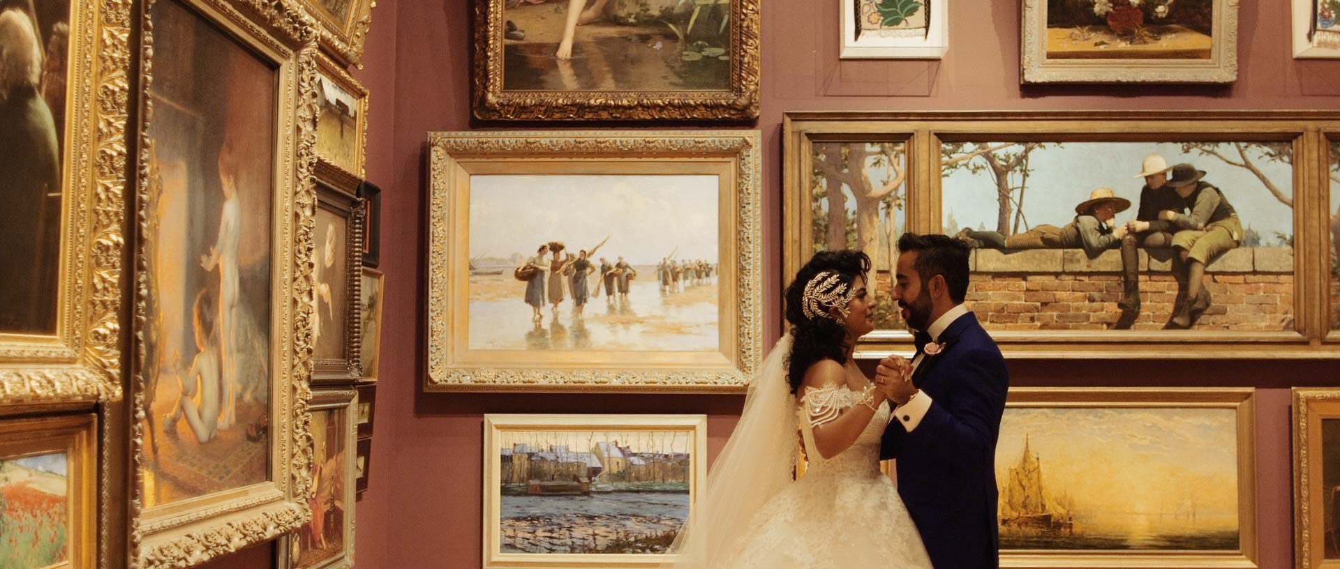 Wedding couple in art gallery