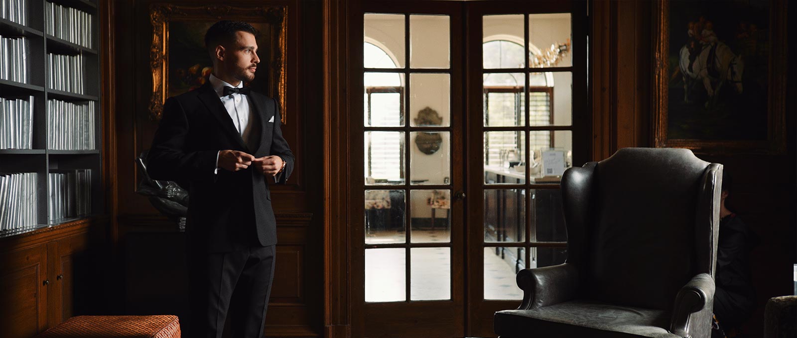 Groom gets ready in Graydon Hall's study moments before his wedding ceremony.