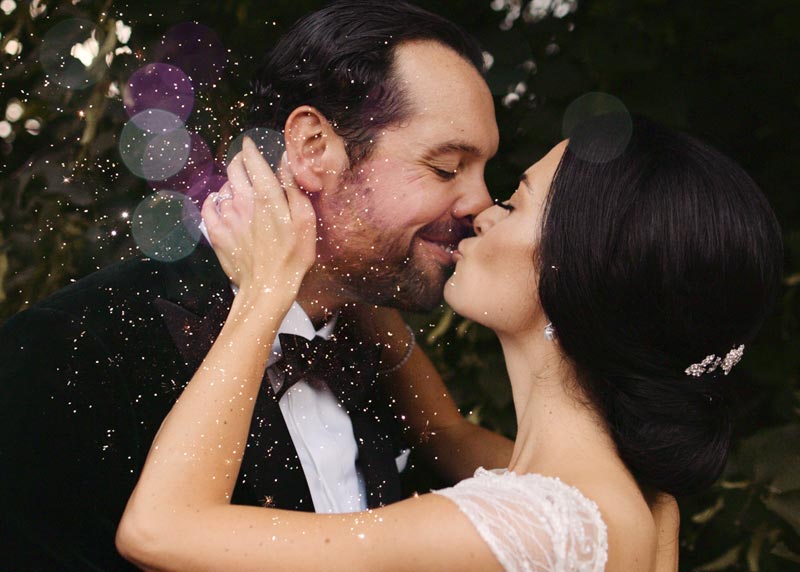 Couple kisses at their Four Seasons Hotel wedding in Toronto