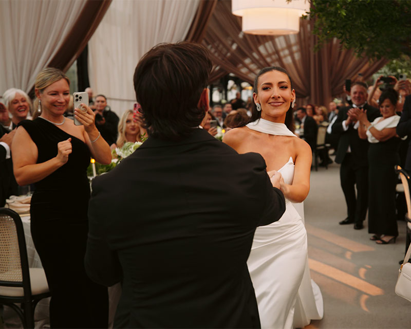 Alessandra and Steve entering their Aga Khan Museum wedding reception