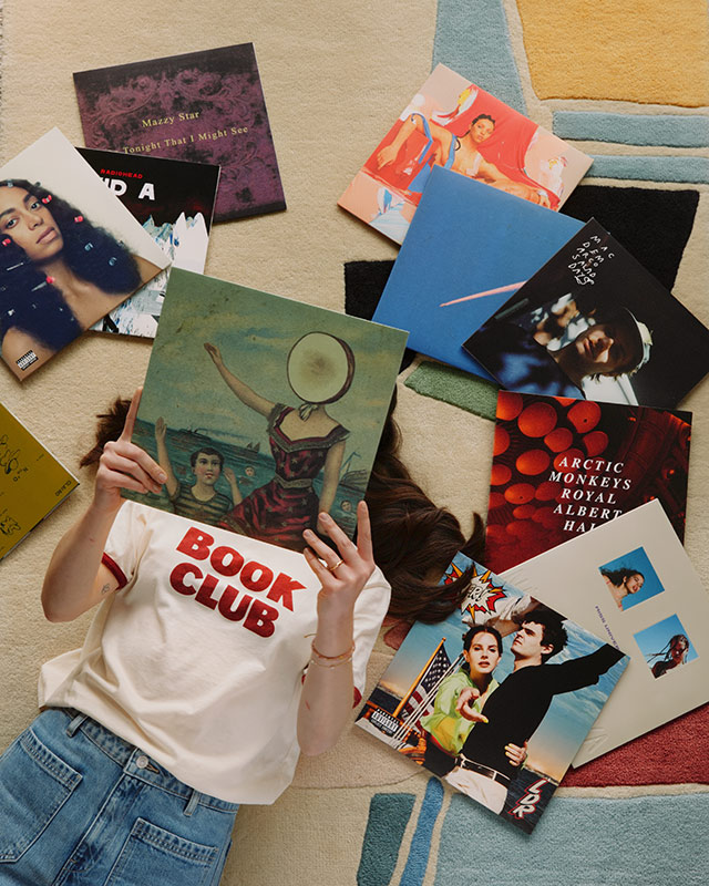 Vic from Outside In Studio sifting through records