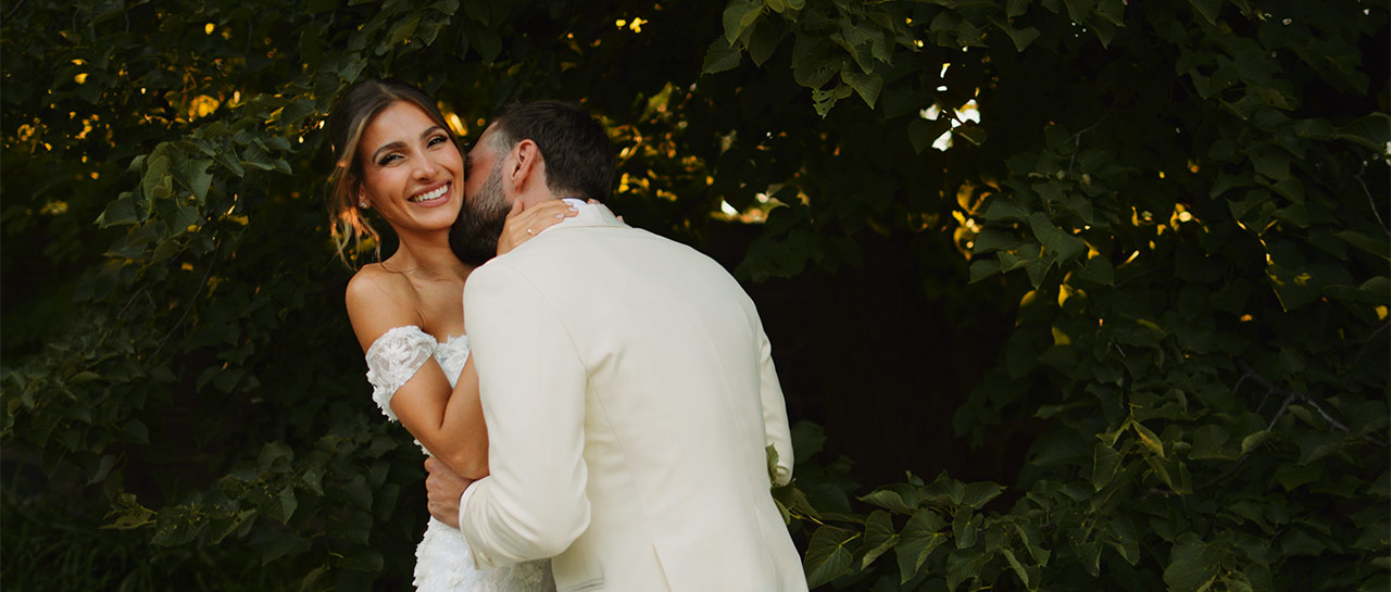 Couple embraces at their Graydon Hall Manor wedding in Toronto