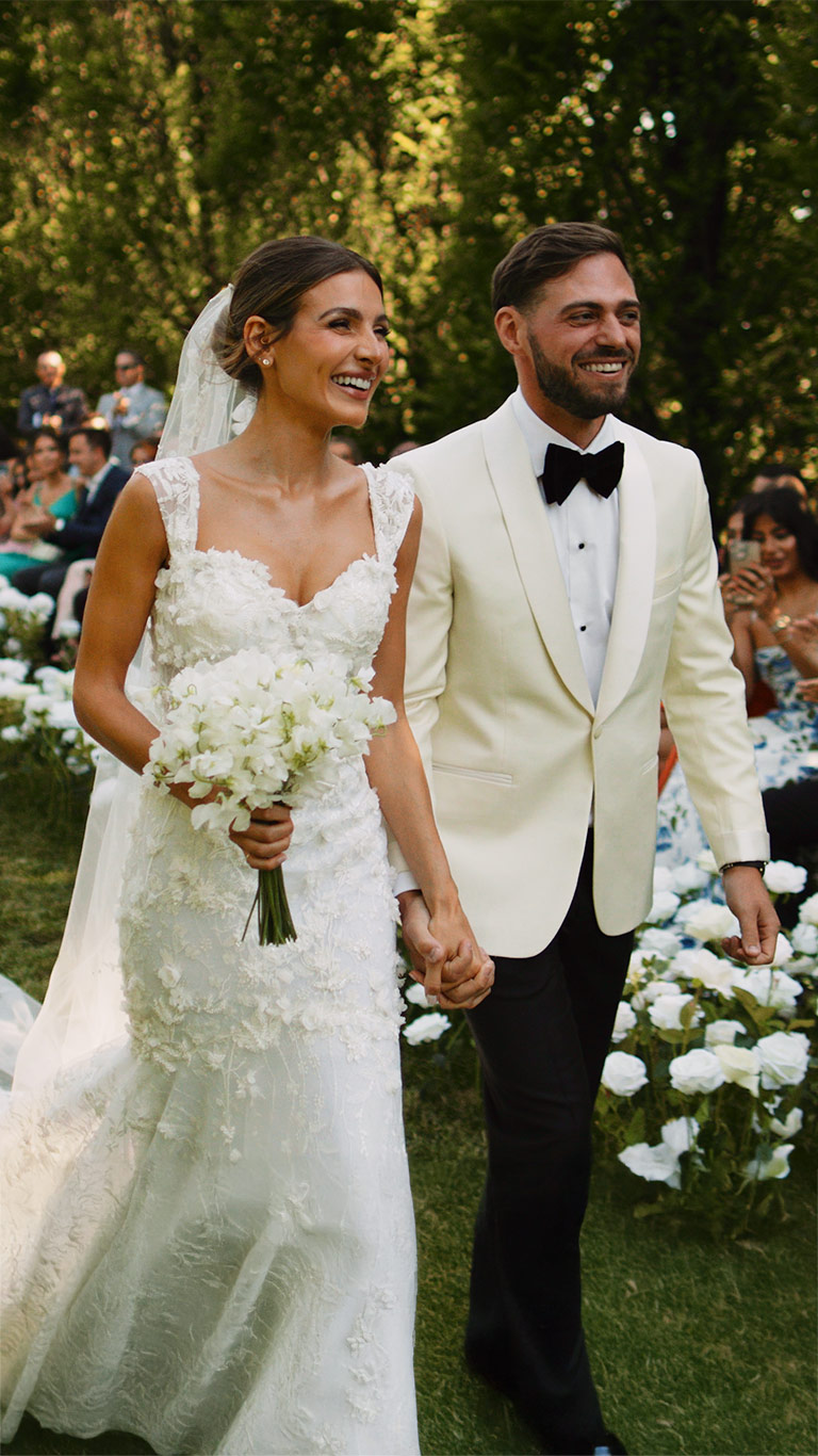 Kalinka and Adriano in a vertical wedding film still at Graydon Hall Manor